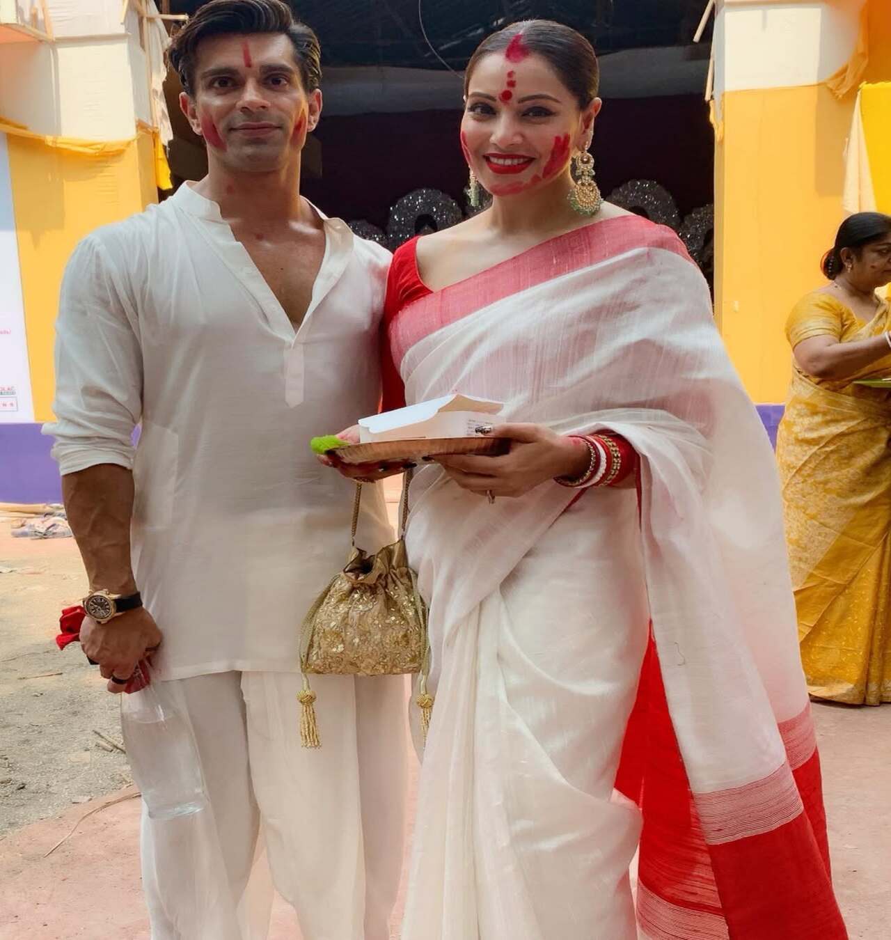 They partake in both Punjabi and Bengali festivals to honour each other's roots. Here, Bipasha and Karan are seen celebrating their first Sindur Khela post marriage. In this ritual, married Bengali women apply sindur to Maa Kali on Dusshera